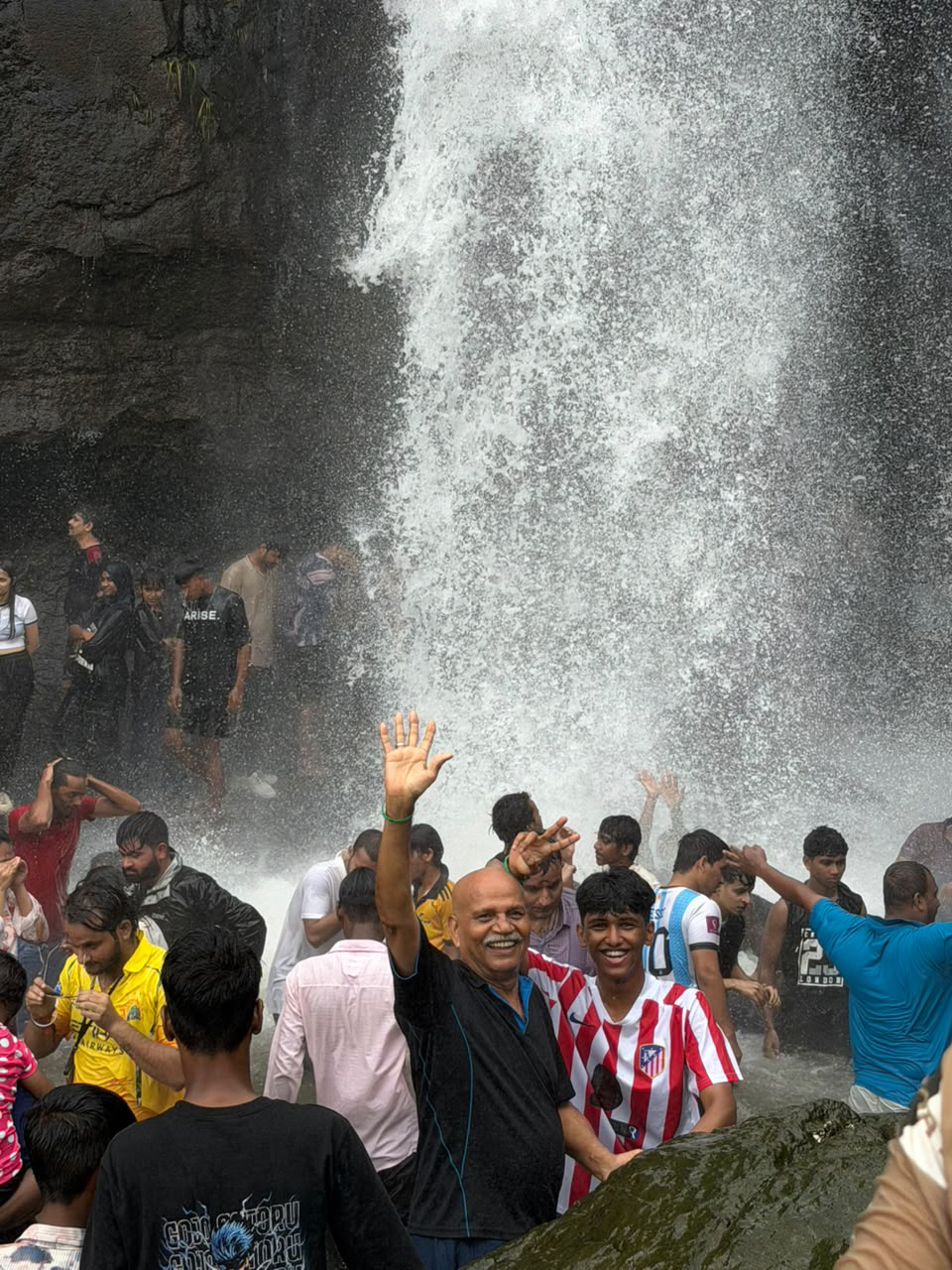 Below the waterfall